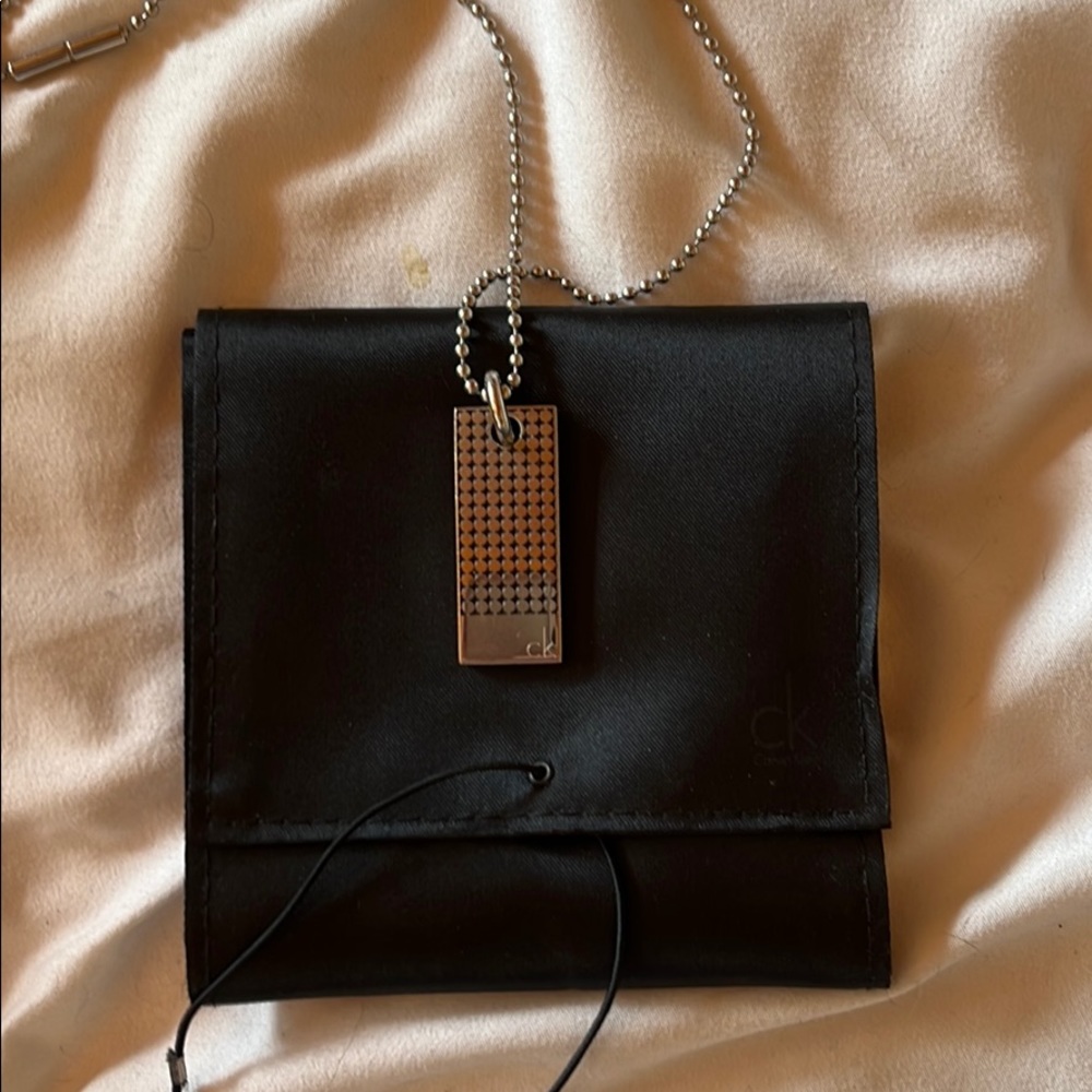 CK necklace with carry case
